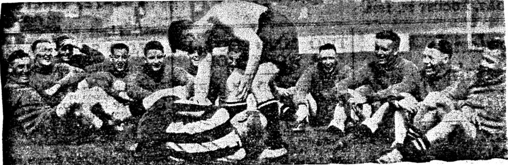 Proudfoot and Seagrave indulge in a wrestling bout during a respite in training at Haig Avenue