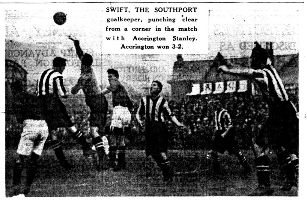 Swift, the southport goalkeeper, punching clear from a corner in the match with Accrington Stanley.